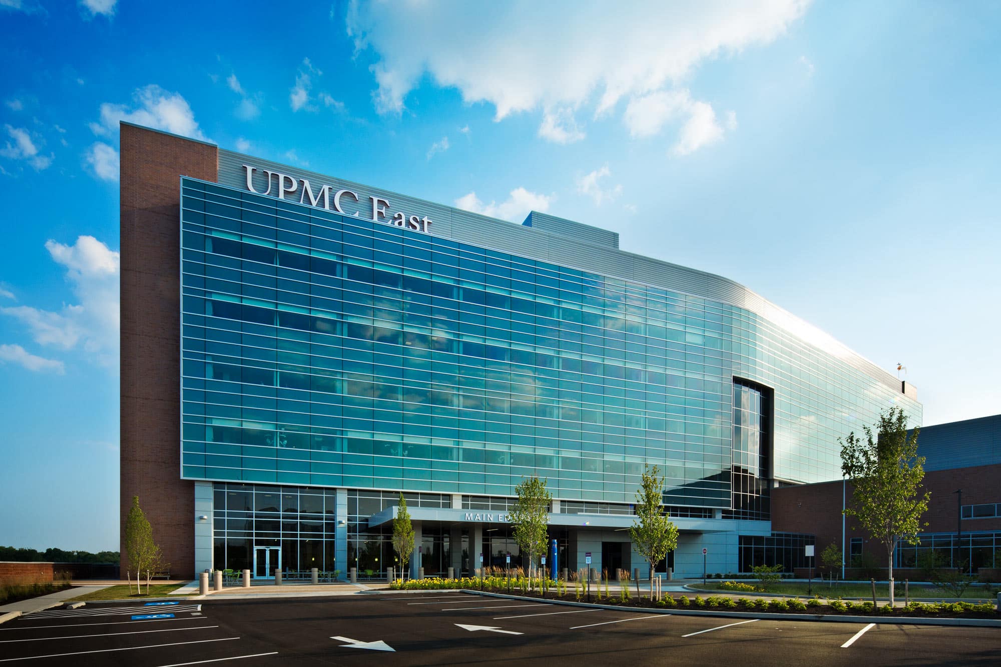 UPMC East Exterior Image Featuring Entryway and Wall of Windows